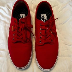 Vans lace up shoes.